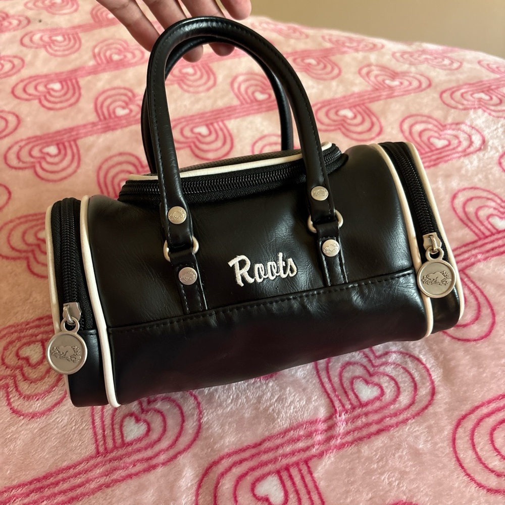 Roots Black Mini Bag with Structured Shape and Sleek Material